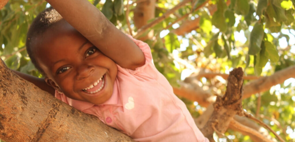 voh child sponsorship girl in tree